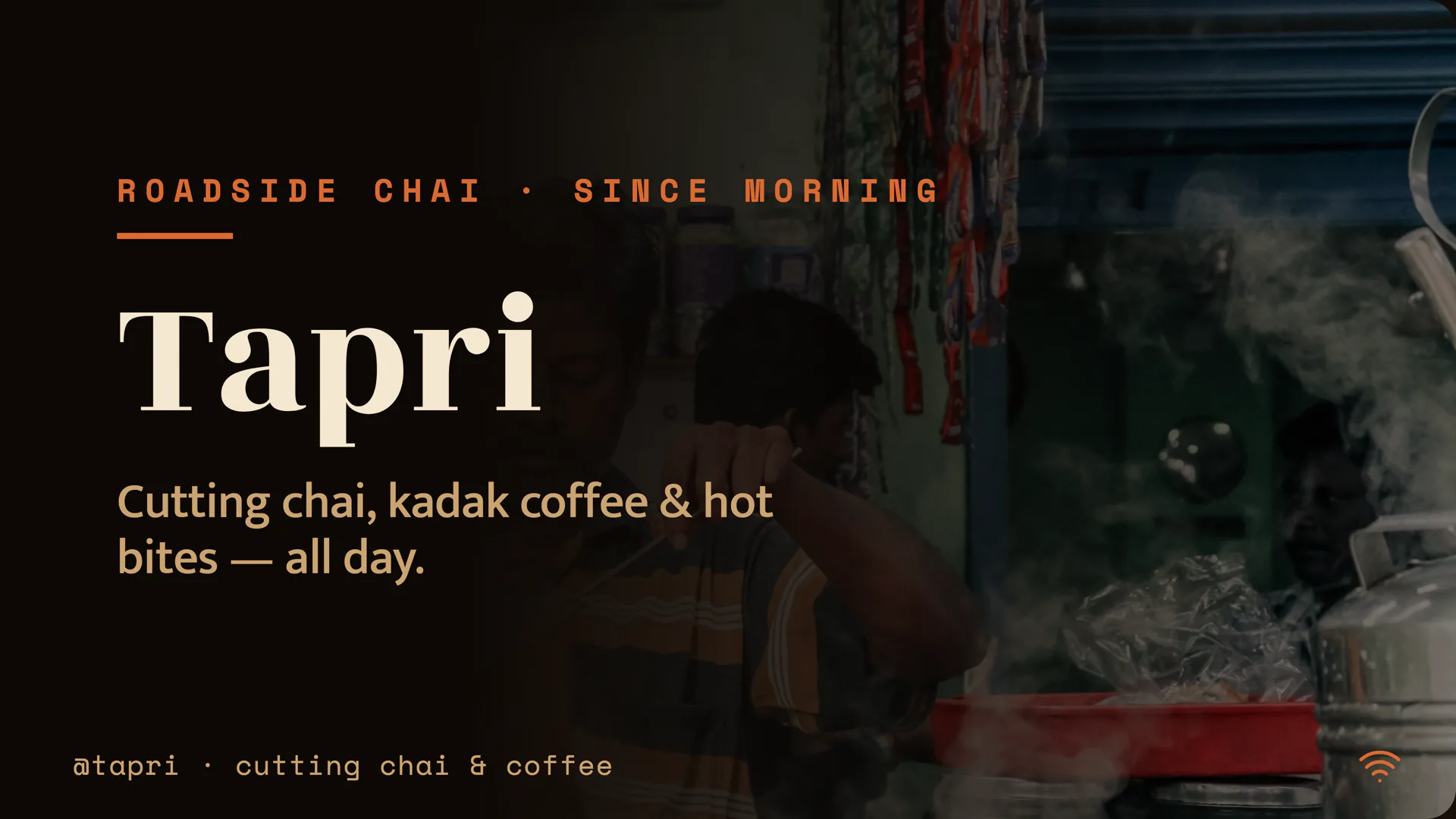 A café board on a TV, showing cutting chai, coffee and hot bites